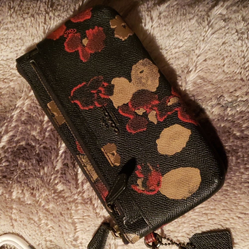 Coach Black Floral Wristlet with Red and Tan Accents